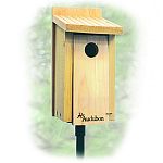  The Audubon Bluebird House is handcrafted of natural cedar. Features an easy-open front for cleaning, and proper ventilation and drainage.  Size: 6.25 x 6.75 x 13 inches 