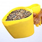 Tapered design makes it easy to pour into the funnel openings of feeders. And the specially designed handle doubles as a bag clip; the seed stays fresher and you always know where the scoop is. Holds 4 cups. Perfect for all types of seed.