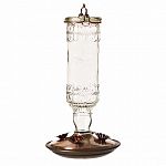 Holds 10 ounces of nectar. Features a clear glass bottle with brushed copper accents. Four decorative flower feeding ports surrounding the base.
