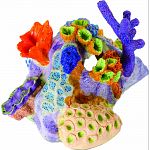 Handcrafted resin, realistic looking pacific reef coral Provides interest, hides and shelter for fish Safe in fresh and saltwater Designed for aquariums, terrariums and most animal habitats Silver tones will illuminate under light