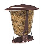 Stylish tapered design with decorative brushed copper finish and locking metal roof. Functional roof tilts when stepped on by a squirrel to close both ports. Two integrated metal perches are spring loaded to close both ports with pressure from a squirrel.