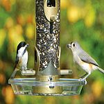 Unbreakable polycarbonate construction. Provides more perching area. Eliminates waste by capturing falling waste. Fits all 2 3/4 inch diameter tubular feeders by aspects. Made in the USA.