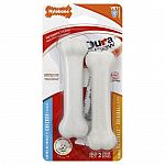 Made from durable tough nylon. A safe, long lasting chew product. Dogs gradually grind it away rather than breaking off chunks. Contains one chicken and one liver flavored petite sized dura chew bone.