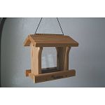 This hand-crafted Ranch Style Bird Feeder is made of natural cedar and is constructed with zinc chromate screws for durability. Aluminum hinges withstand the elements. Base is made of a wire screen for drainage. Feeder has a large seed capacity.