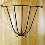 Corner Hayrack by Scenic Road. Capacity: 1/3 bale. Easy to mount and fits neatly in the stall corner.