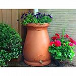 Urn shape and color add class and style to your rain harvesting. Top functions as a planter which can leech overflow water from the rain barrel. Meshed screen blocks debris from entering your water supply. Flatback design sits tightly against any outside