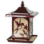 This beautiful bird feeder features a hummingbird design that is consists of a high quality powder coated finish in red and is rust resistant. Design is featured on each side. Holds up to 5.5 lbs. of seed.