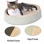 The Thermo-Kitty Cuddle Up is a heated bed to keep your cat comfy and cozy. This is an energy efficient low wattage heated cat bed. Washable. Available in 2 color combinations. Size 16