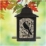 Features a detailed screen printed design of birds & berries on all four sides. Holds up to 5 pounds of seed and has 4 feeding stations. Powder coated black finish. Sure-lock cap system that keeps squirrels out. Bird-preferred u-shape perches.
